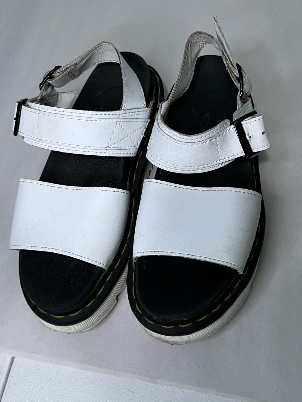 Dr. Martens White Leather Two-Strap Sandals with Black Footbed